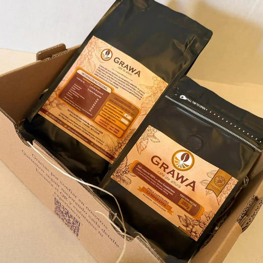 A premium coffee gift box featuring two bags of Grawa 100% Arabica specialty coffee from Finca La Esperanza, Ecuador.